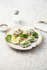 Spinach ravioli with lemon and cream