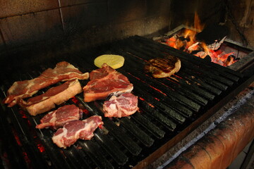 Traditional beef meat on a barbecue in Argentinean asado meal