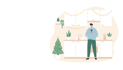 Man uses smartphone in a festive modern kitchen decorated for Christmas holidays