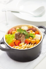 Canarian stew: a chickpea stew with various meats and pasta.