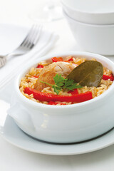 Baked rice with Cabidela chicken and seasonal vegetables.