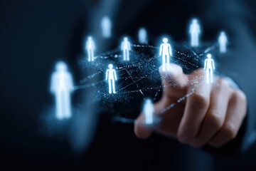 Digital network concept with glowing human icons connected by lines over a person&rsquo;s hand pointing forward.