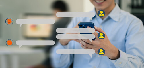 Businessman uses artificial intelligence chatbots automatically respond online messages to help customers instantly.