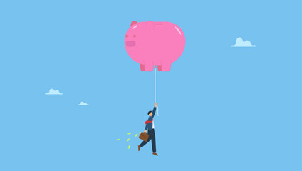 Wealthy rich businessman floating high in the sky with piggy bank balloon. Financial freedom or financial independence.