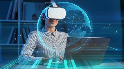 Woman using VR headset and laptop in a futuristic office. - Powered by Adobe