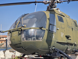 old military helicopter with its olive green color