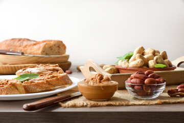 Wooden table with freshly prepared peanut butter snack