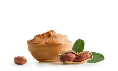 Peanut butter in a glass bowl isolated on white background