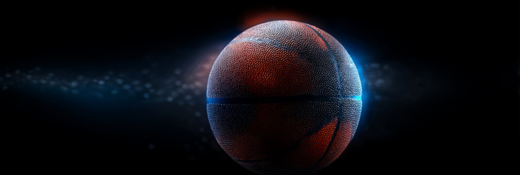 Action close-up of a man's hand holding a basketbal