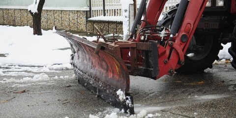 Vehicle-mounted snowplow.