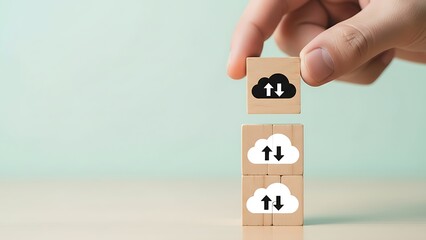 A person stacking wooden blocks with up and down arrows