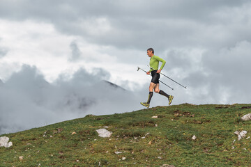 Man practices sports activity in the mountains