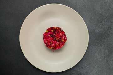 Classic Russian Beet Salad with Mustard Seeds on Plate. Vinaigrette