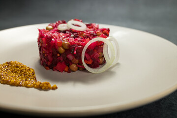 Classic Russian Beet Salad with Mustard Seeds on Plate. Vinaigrette