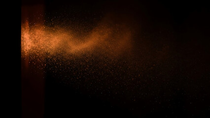 Orange dust particles floating in dark background