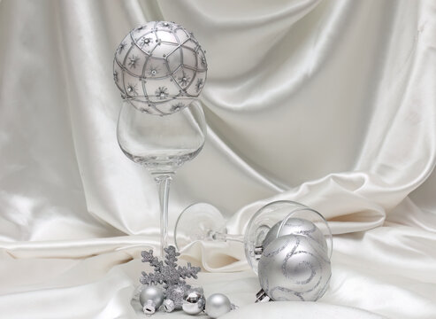 White Christmas decoration with balls and goblets