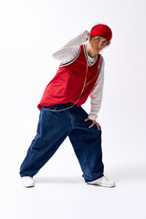 Stylish teenager showcases hip hop fashion with confidence and flair