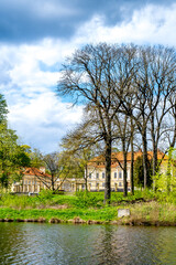 Fototapeta premium Mansion in a park near a lake