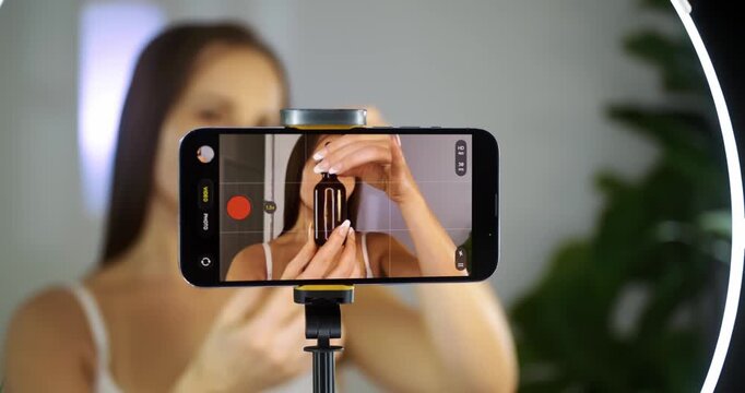 Influencer Filming Makeup Tutorial at Home Studio