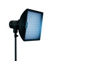 Professional softbox studio lighting equipment with grid modifier illuminating blue light, ready for creative photography