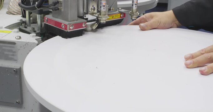 Industrial woodworking machine trimming round panel edges