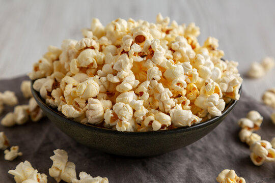 Homemade Salty Popcorn in a Bowl, low angle view.