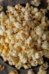 Homemade Salty Popcorn in a Bowl, top view. Flat lay, overhead, from above.