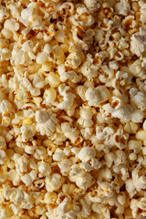 Homemade Salty Popcorn in a Bowl, top view. Flat lay, overhead, from above.