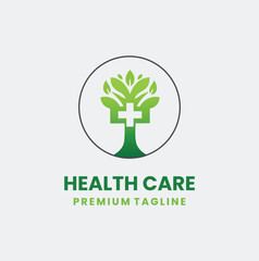 Natural health logo combining a medical cross with a leafy green tree, symbolizing wellness, organic medicine, and natural growth.