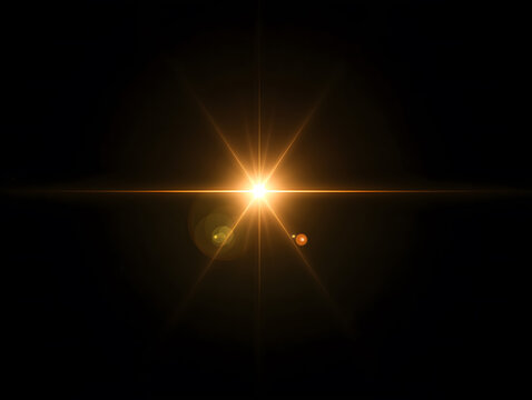Golden Starburst Lens Flare on Black Background