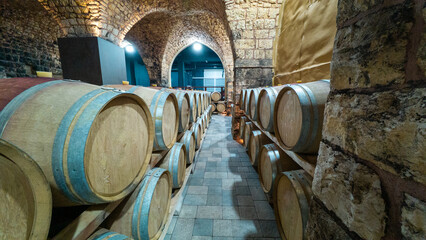 Rustic Wine Cellar with Wooden Barrels © M