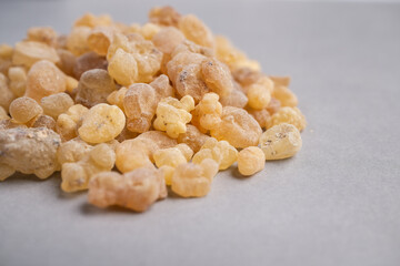 Macro Still Life of Natural Pale Yellow Frankincense Resin Tears (Boswellia sacra) Used for Incense, Aromatherapy, and Herbal Medi