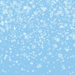 Low angle view of snowflake against blue sky