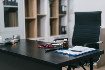 An empty doctor's desk in a clinic, filled with scattered medication bottles and documents. A neat yet vibrant workspace. A medical environment and healthcare preparation for patient care