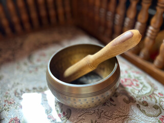 brass singing bowls arranged on soft white fabric, sound bath, A peaceful, spiritual composition symbolizing sound healing, meditation, and mindful balance in holistic wellness practice
