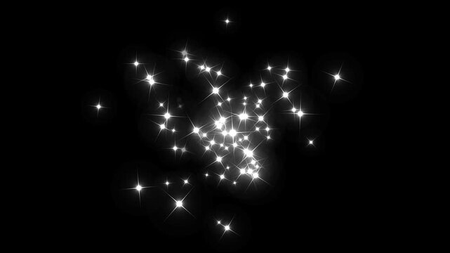 White glittering star dust trail sparkling particles on black background. twinkle star burst glitter sparkle. shining white particle stars dust. fairy tail glitter particles sparkling. 4k video