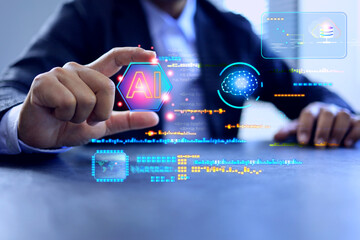 artificial intelligence concept with businessman using AI as assistant for business planning and data analysis on working table