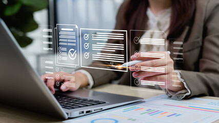 Businesswoman reviewing checklist and checkbox items, giving feedback and analyzing survey results...