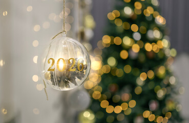 New Year's background with Christmas tree, bokeh and numbers 2026