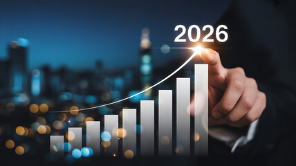 Anticipating growth and success in 2026 with financial forecasting and rising business charts on a vibrant skyline backdrop