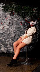 Woman in carnival masquerade mask. Party