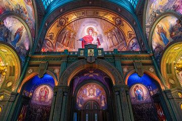 View of vibrant religious murals and intricate archways create a sacred space, rich with color and detail in Kubinka, Moscow Oblast, Russia.