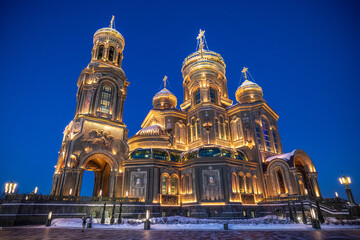 View of the Main Cathedral of the Russian Armed Forces illuminated against a deep blue sky, a beacon of light and architectural grandeur, Kubinka, Moscow Oblast, Russia.