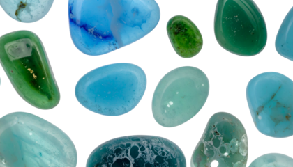 Close-up view of assorted, polished, smooth, colorful gemstones against a black background