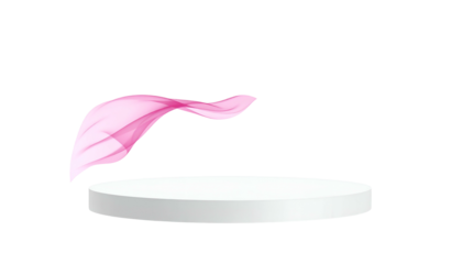White pedestal with floating pink fabric against a black background