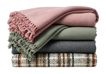 Stacked cozy throws with tassels and plaid pattern