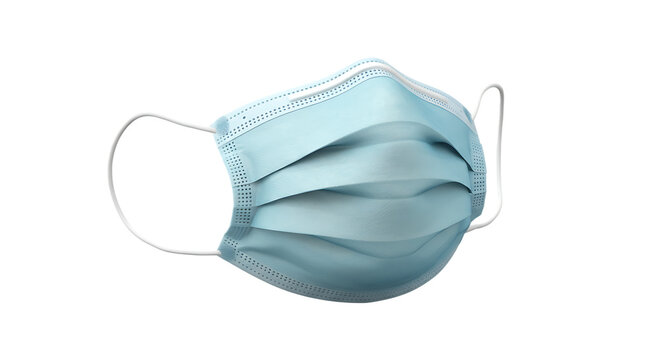 A light blue disposable surgical face mask isolated on a black background for safety