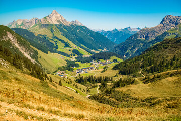 Fototapeta premium Alpine summer view with Mount Biberkopf in the background seen from Steffisalp, Warth, Bregenz, Vorarlberg, Austria