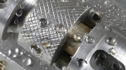Macro Study of Knurled Stainless Component with Water Droplets