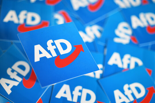 Burgdorf, Lower Saxony, Germany - December 12, 2025: Stickers with the logo of the right-wing party AfD, Alternative for Germany